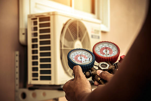 Professional Heat Pump Repair technician working in Cumberland, IN